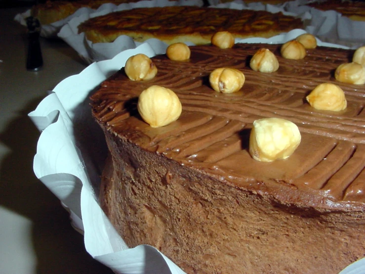 a chocolate cake with toppings on a table