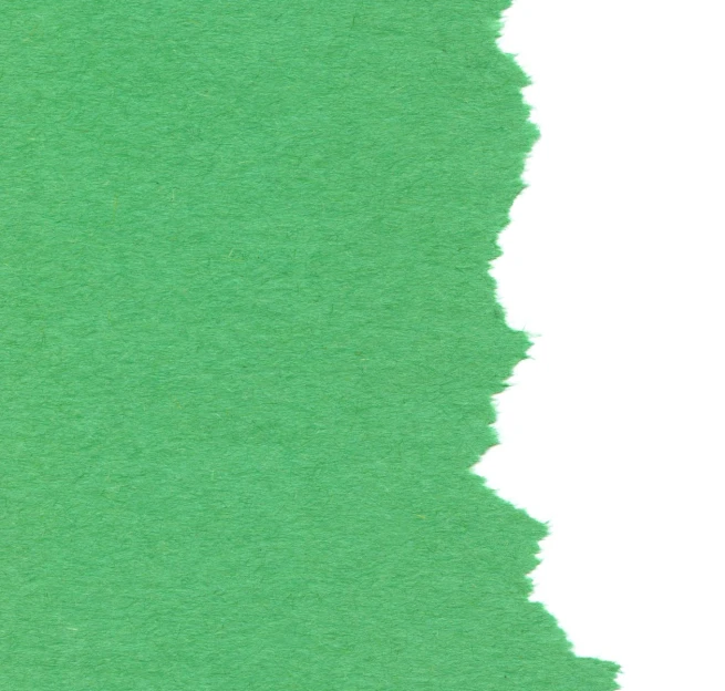 a closeup of some green crayon paper