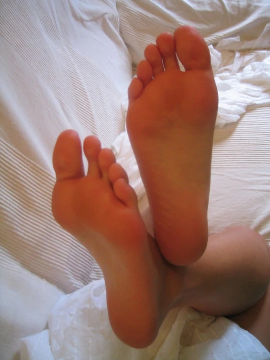 a close up of an open human's feet