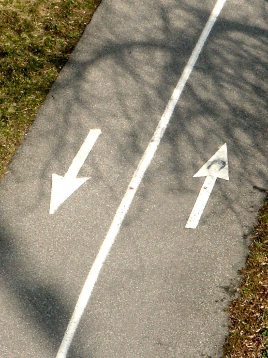 the two arrows in the street are drawn up