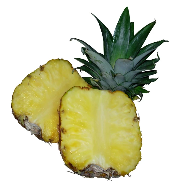 two pineapple halves are cut into small pieces