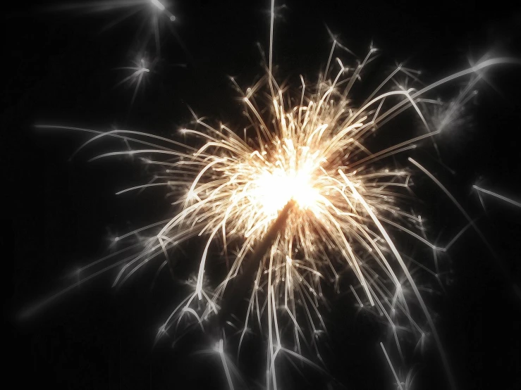 a close up of a fireworks that looks like it is glowing