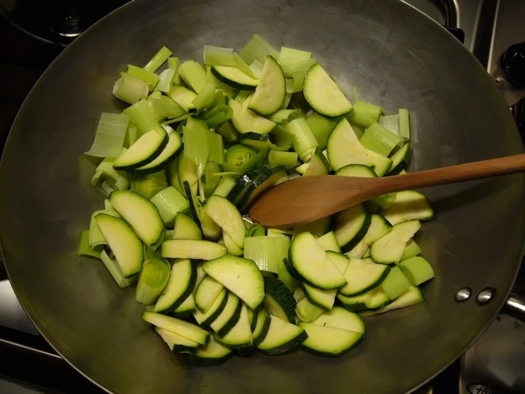 cooked cut zucchini is in the frying pan