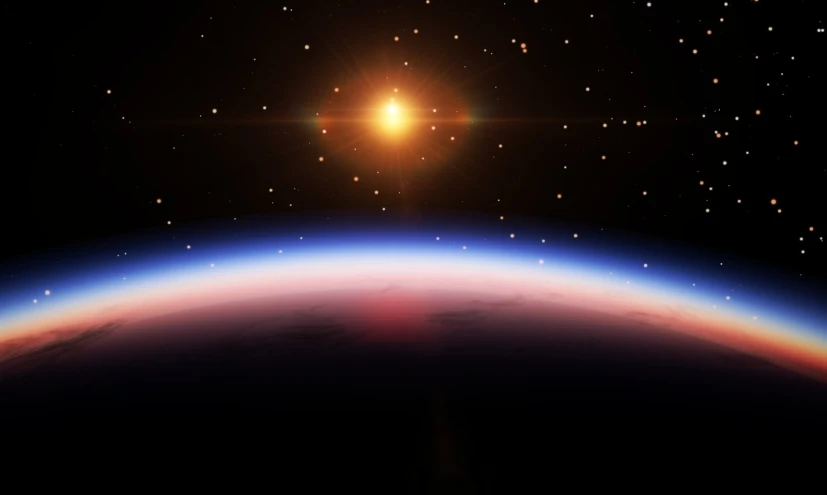 the sun rising over the horizon of a planet