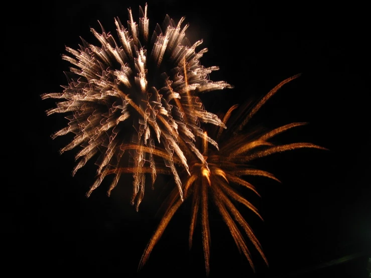 a fireworks display in the sky is shown