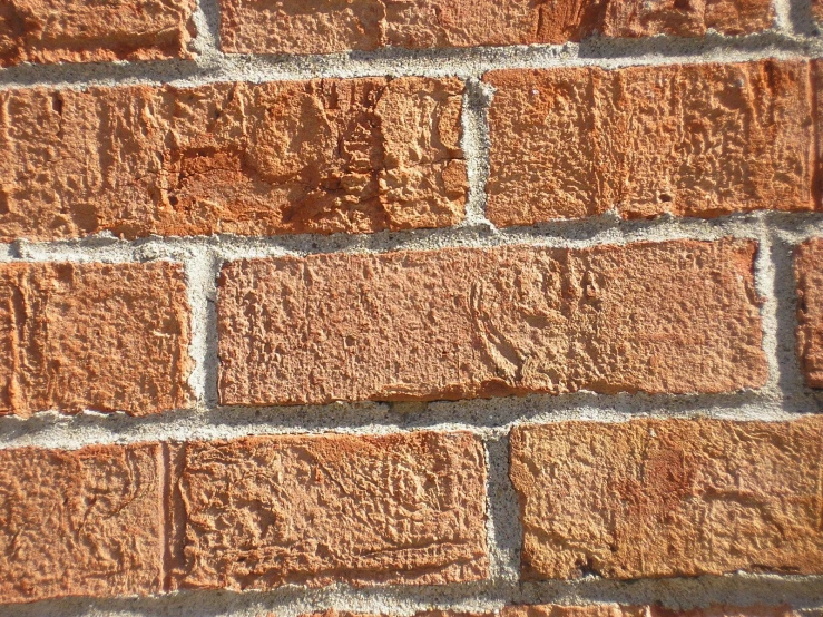 the brick is textured with light sand colored bricks