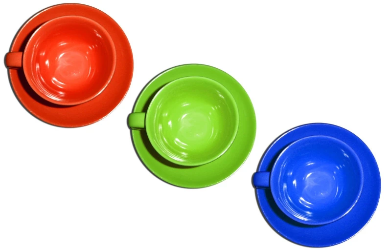 a group of three bowls with handles are sitting in the same row