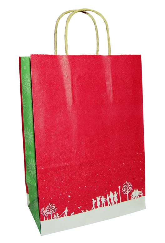 a large red paper bag with green handle and white trees and people on it