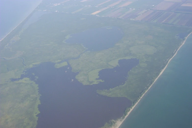 an aerial s of the sea and land