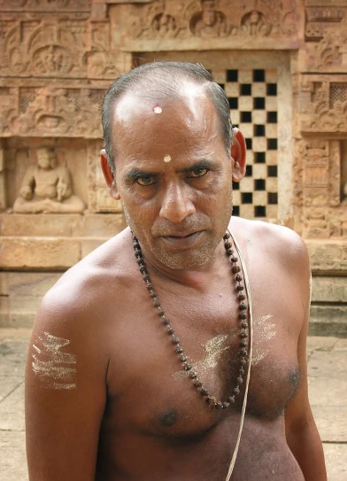 a man that has very small tattoos on his body