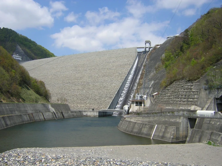 an outdoor view of a large concrete dam