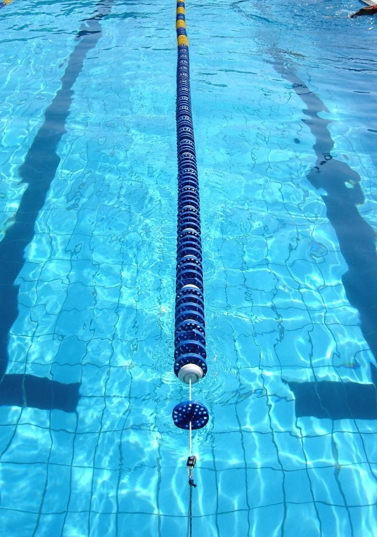 an empty swimming pool filled with people in it