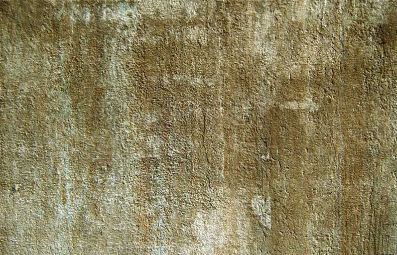 a close up of an old dirty wall