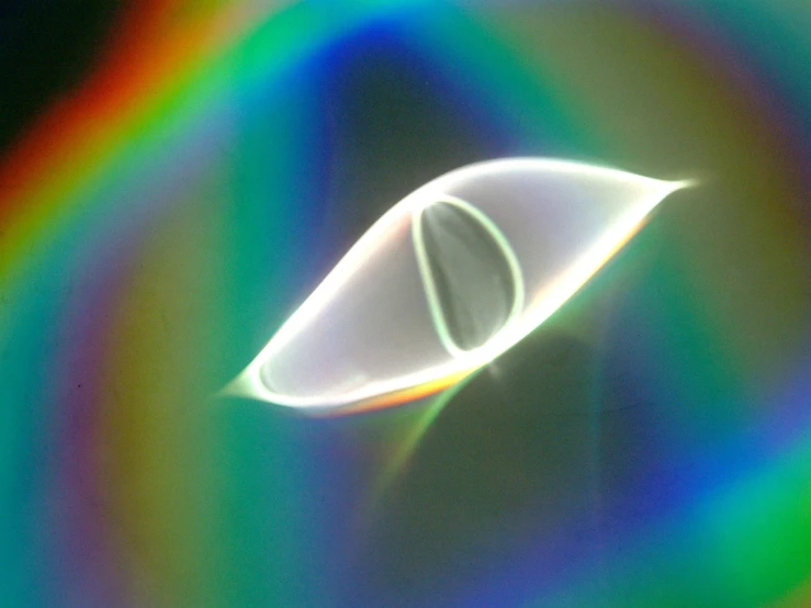 a large white object with many rainbow circles