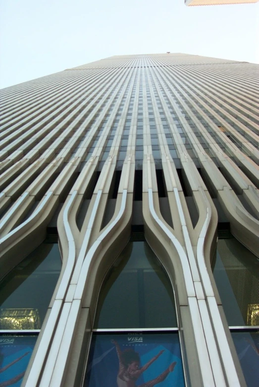 the curved building is very modern with a window