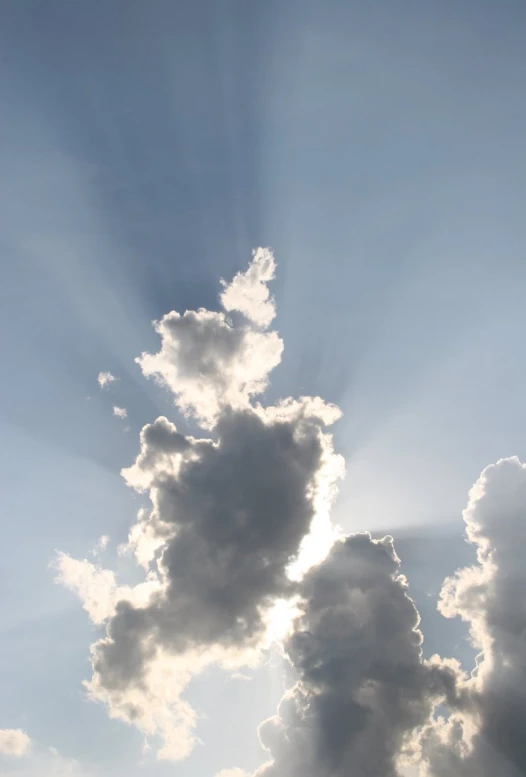 a cloud covered in the sun with very bright lights