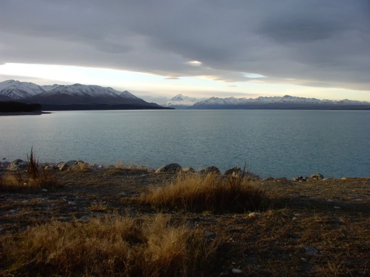 view of mountain ranges and an empty lake