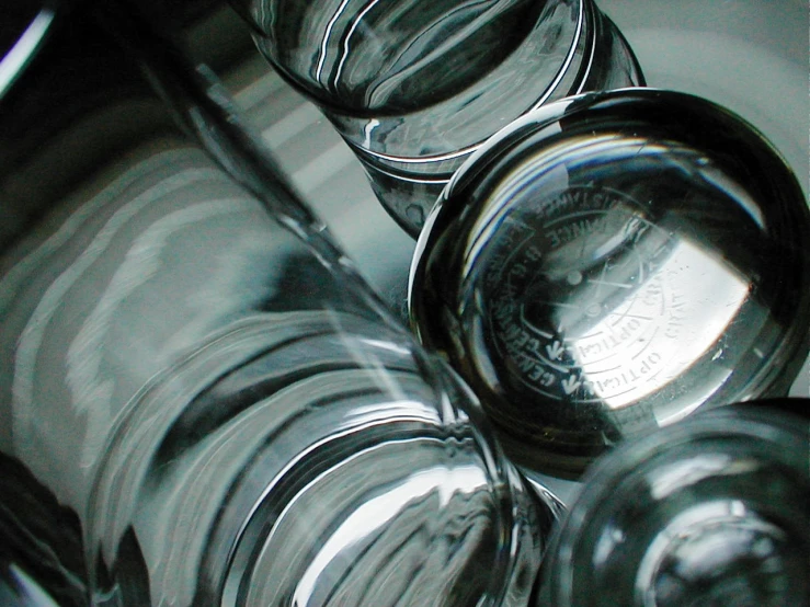 an image of glass pots on a shelf