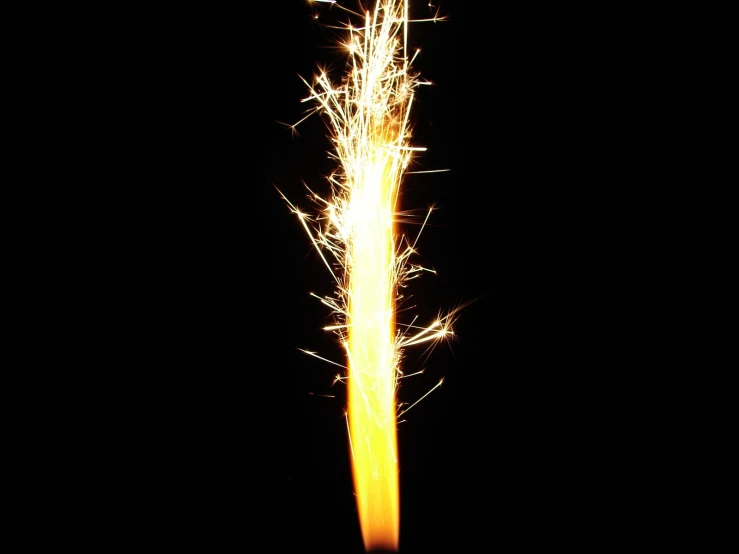 a firework at night on black background