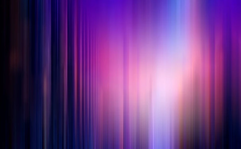 a blurred image of lines against purple and blue background