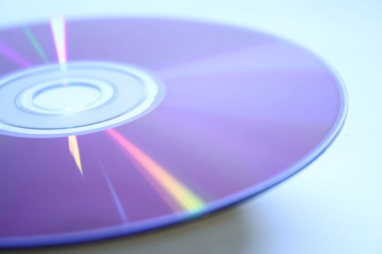 a purple dvd that is in front of a white background