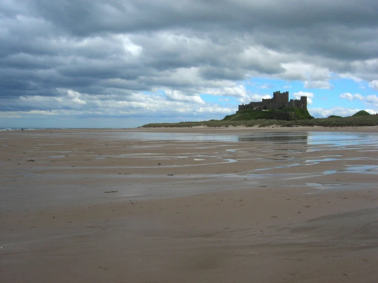 a person is on the beach and there are some sand