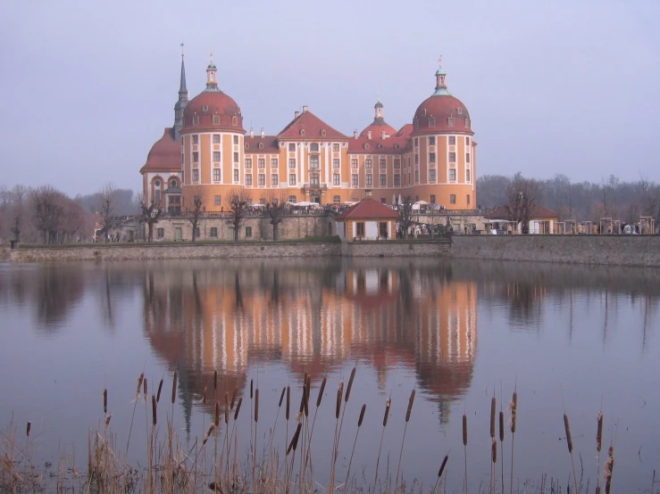 a large castle like building with a red roof