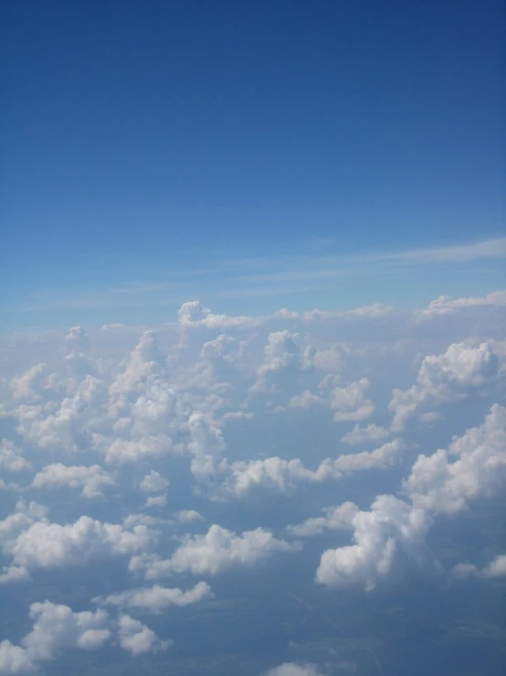 a blue sky filled with lots of clouds