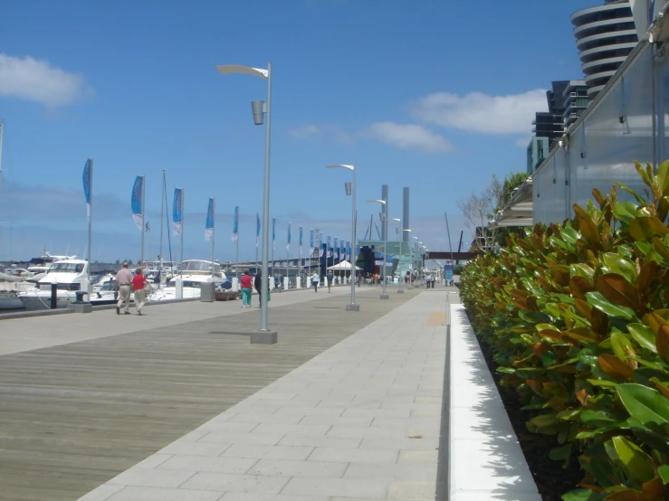 the pier at marina city has many flags flying in the breeze