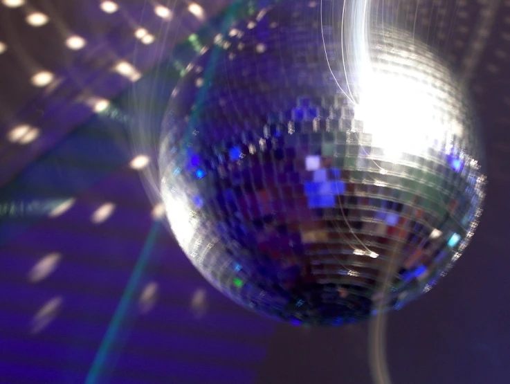 a disco ball that is floating upside down