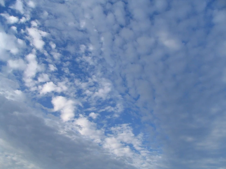 blue skies are shown, with some clouds in the sky