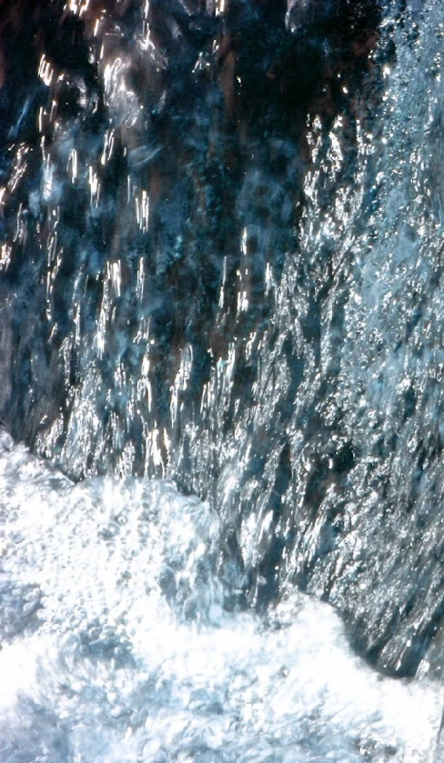 a water jet sitting on top of a pool of water