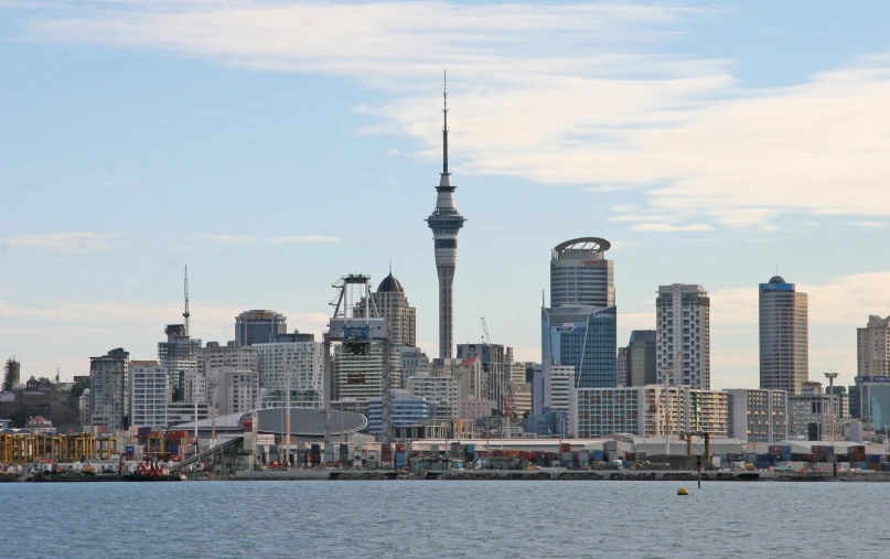 a po of the skyscrapper as seen from the water