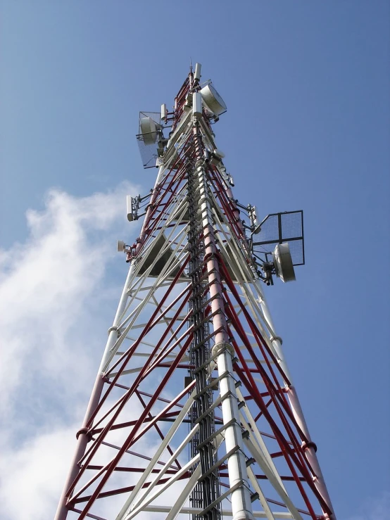 a large tower with various cell phones on top