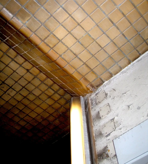 an overhead view of tiled walls and a window