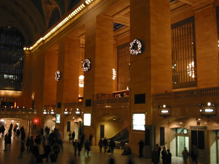 a large building with columns with lights