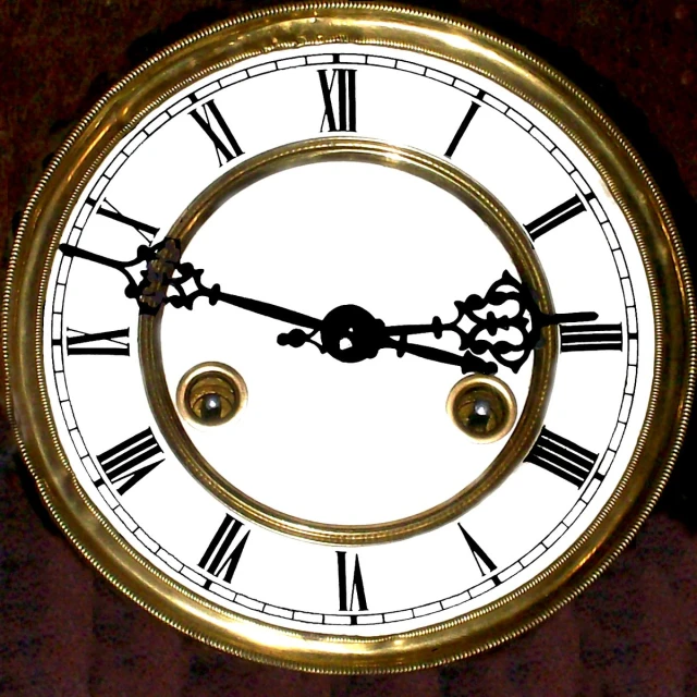 a large clock with roman numerals on the side of it