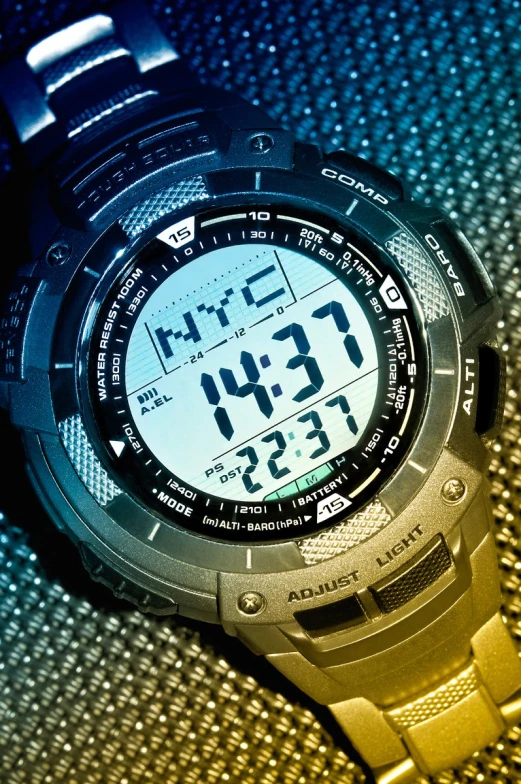 an alarm watch laying on the ground, on the floor