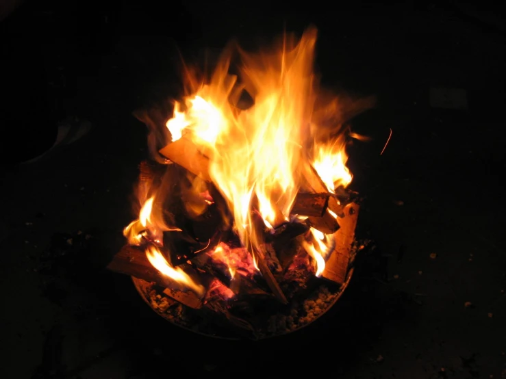 an image of a bonfire burning at night