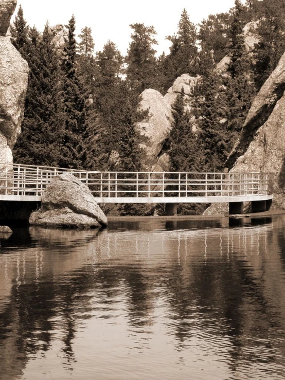 the bridge across the lake is made of metal