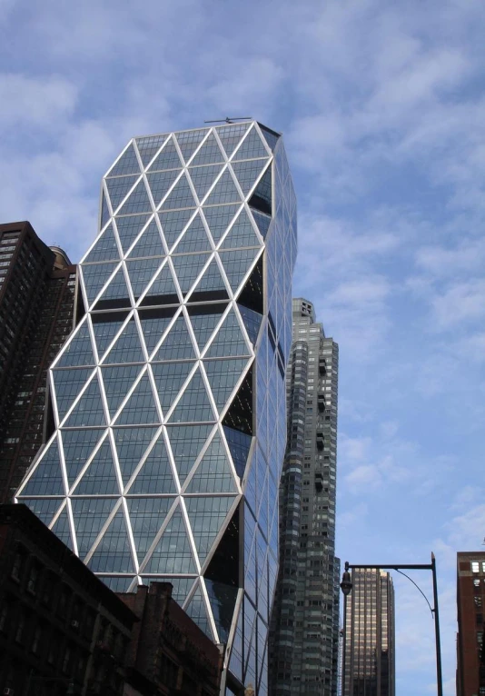 a blue skyscr and a building that looks like an effescing structure