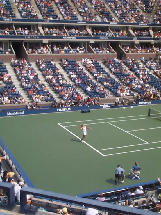 an aerial s of the court and crowd in a tennis match