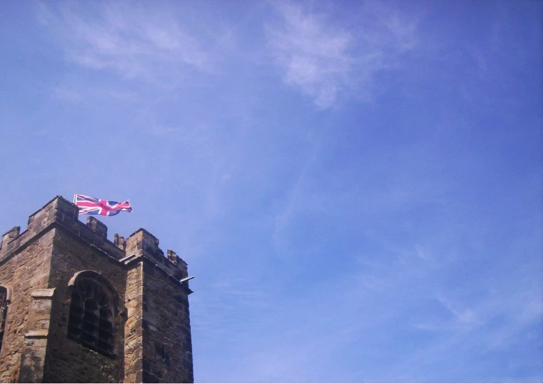 the union flag flies over the city of london