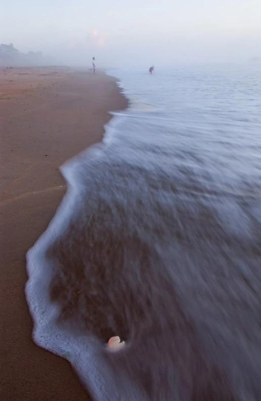 a large body of water near the shore