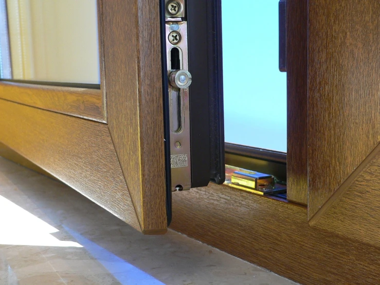 a pair of open brown doors on a house