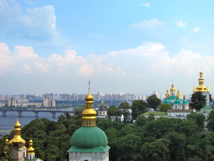 a large white building with gold accents in the background