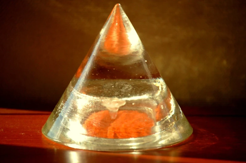 a picture of a glass cone on a table