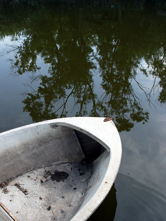 a boat is shown on the calm water