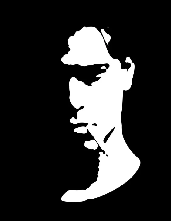 the silhouette of a man's face in black and white