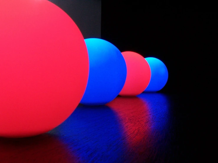 four balls on the table have different colors